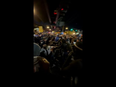 Congressional candidate knocked to ground during ICE protest