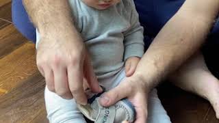 How easy is to put on baby first shoes?