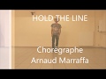 Regardez "Hold The Line" sur YouTube