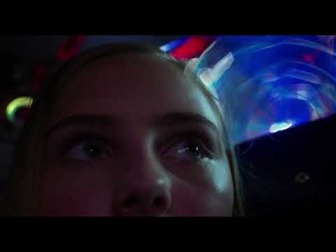 Earth to Echo trailer frame with glowing gadgetry, evoking the post-rock and synth palette