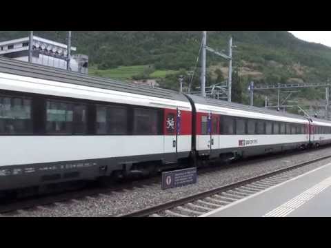 Re 460. SBB CON CARROZZE PASSEGGERI PARTE DA VISP (CH) 22 - 6 - 2014.