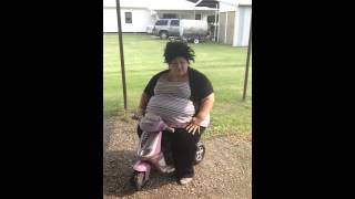 Nikki falls off kid toy while singing remix to ignition lol