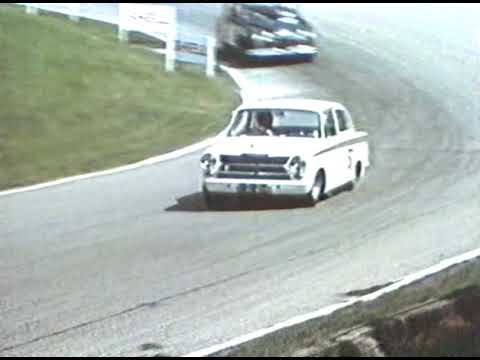 Jim clark driving his ford cortina rally car and touring car