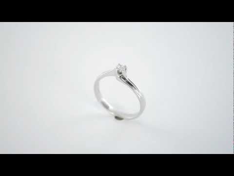 Anello solitario in oro e diamanti  0.07 ct G VS