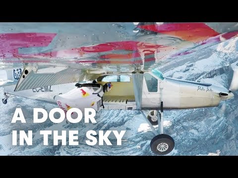 Daring Wingsuit Flyers Fly Straight into a Moving Plane!