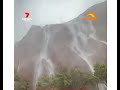 FRIDAY FUN AUSSIE TOURISTS GOT TREATED TO THE RARE ULURU AYERS ROCK WATERFALL
