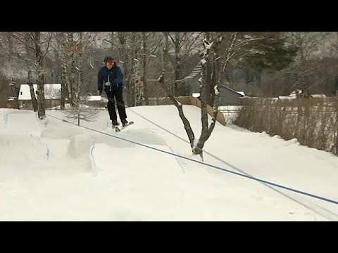 Boy builds snow machine and ski lift in his garden