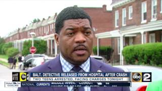 Baltimore police officer struck by carjacked vehicle