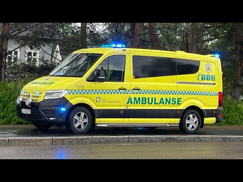 VW Crafter ambulance driving off from a scene