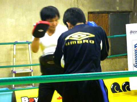 2010年10月30日、社会人練習生のミット打ち（小泉さん）