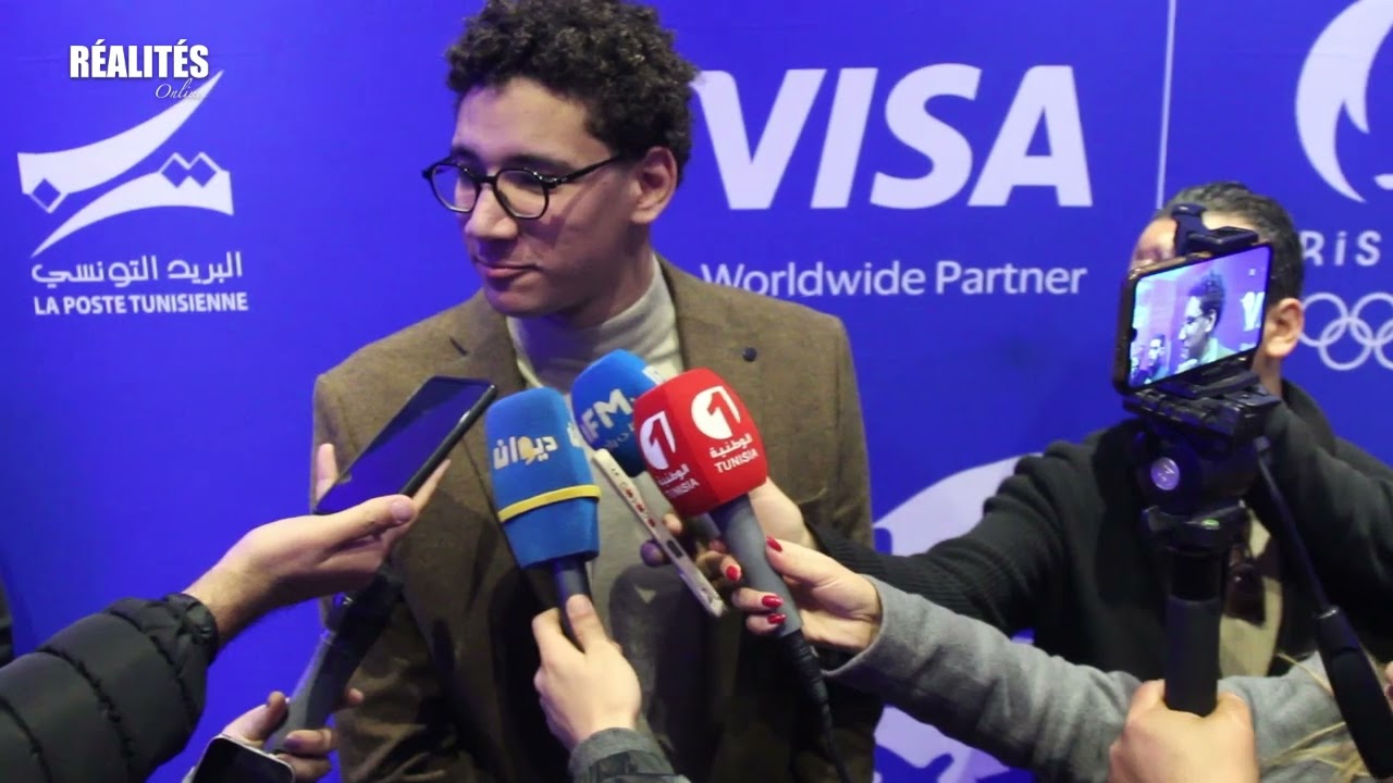 Le champion du monde Ahmed Hafnaoui signe son premier contrat de ...