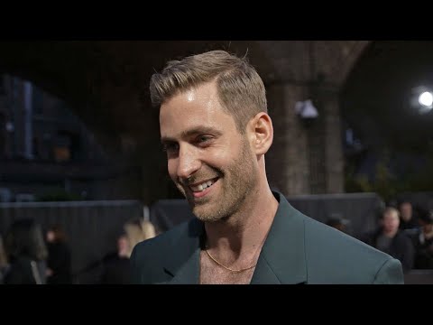Oliver Jackson-Cohen chats about playing Weightman in EMILY (2022) at the movie's London premiere