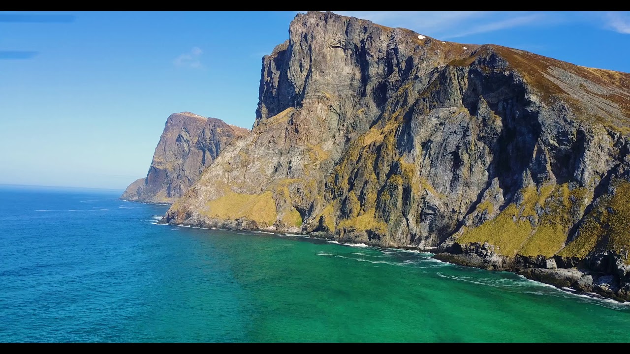 Experience the beautiful soaring vistas of Kvalvika Beach.