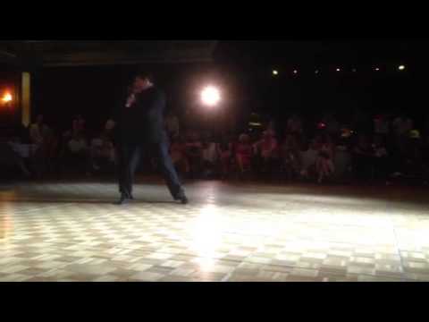  Leonardo Sardella  and  Walter Pérez  are  dancing  to  the  tango  "  Café Domínguez  "  at  Nice Tango Festival  in  2013