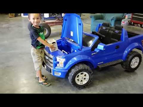 Kruz Fixing The Power Wheel Ride On Ford F-150 (Changing The Battery)