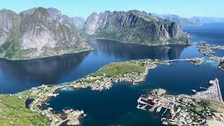 Norway🇳🇴 an amazing view of the peaks and the islets below with charming little 