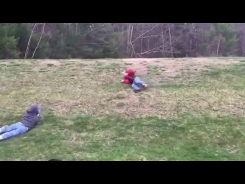 Boys Rolling in Grass