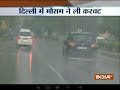 Temperature dips as Delhi witnesses rainfall