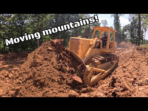 Pushing dirt with an International Dresser TD25G bulldozer better than a CAT or John Deere?