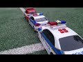 Two Toy Police Cars Are Pushing An Ambulance Hello Carbot Tobot