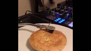 What happens when you throw a meat pie on a record player...