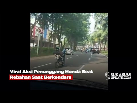 Viral Aksi Penunggang Honda Beat Rebahan Saat Berkendara