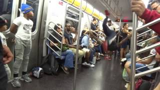 acrobatics New York City Subway Q-train