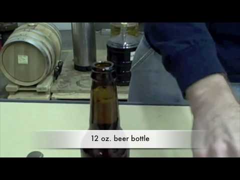 Part of a video titled Capping a bottle - YouTube