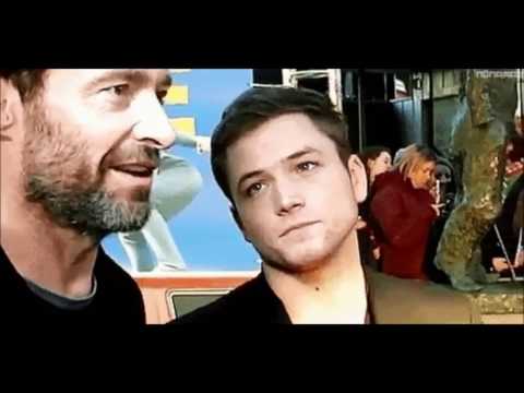 Taron Egerton Staring Seductively at Hugh Jackman
