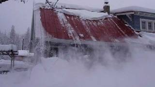 preview picture of video 'Snow Sliding Off The Roof..  A Roof Avalanche'