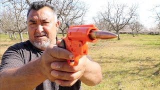 Flare gun with rubber band ?