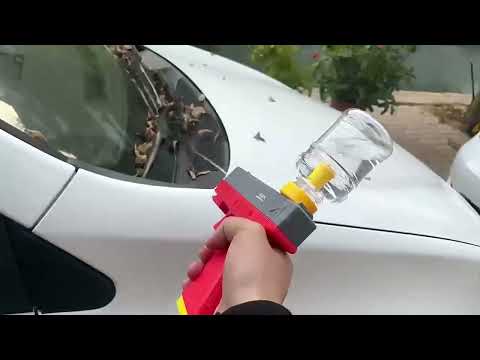 glock water gun soaker blaster cleaning a car