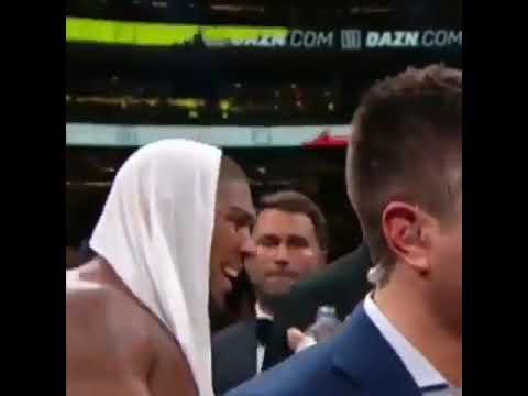 Anthony Joshua stopping his father from going at Eddie Hearn.