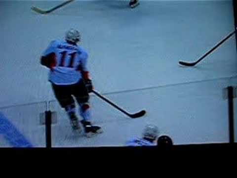 Daniel Alfredsson gets taken out by Mark Bell