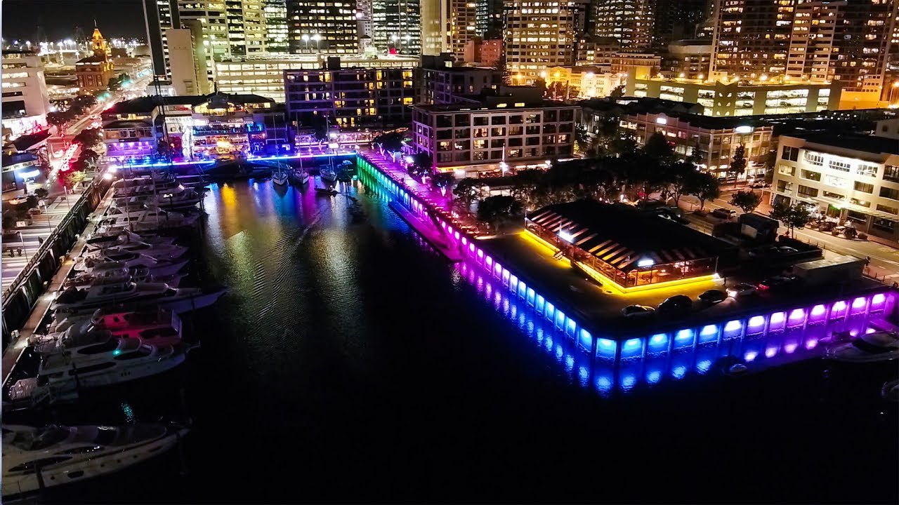 Experience the panoramas of Viaduct Harbour,illuminated at night.