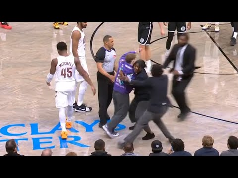 Fan runs on court and up to Donovan Mitchell during Cavs vs Nets 😬