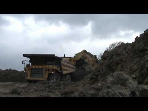 UK Coal's CATERPILLAR 385C loading CATERPILLAR 777 trucks