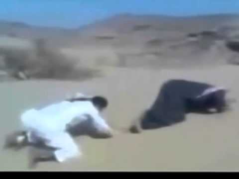 Arab Imam falls in Sand while performing prayers Funny Prank