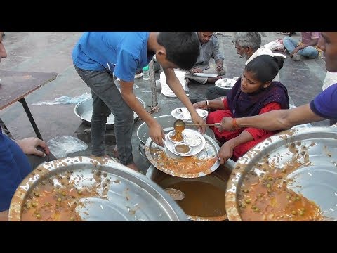 Free Food Distribution for All Besides Hanuman Temple New Delhi Video
