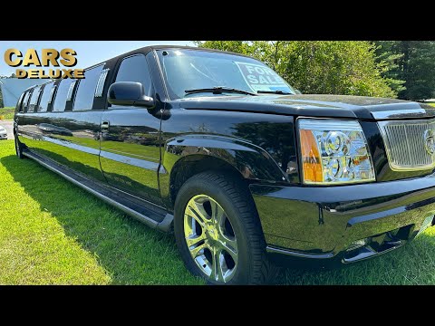 2003 Cadilac limousine, 2013 rusted Subaru