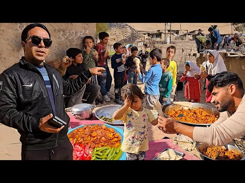 Distribution of delicious food among the village children by Mahmoud and Aghil