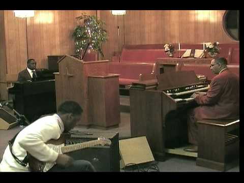 Pastor Curtis Daniel, Organist  -playing 'Praise Him!'