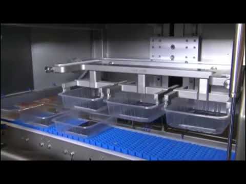 Tramper D 360   stand alone denester for placing trays on a conveyor belt