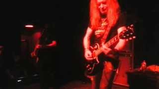 Saxon shows off Screams of Angels shirt on stage!