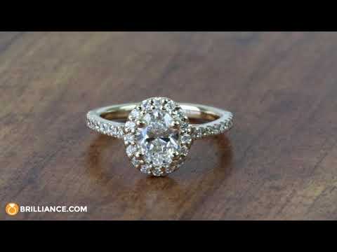 0.81 Carat Oval Pave Halo Diamond Engagement Ring