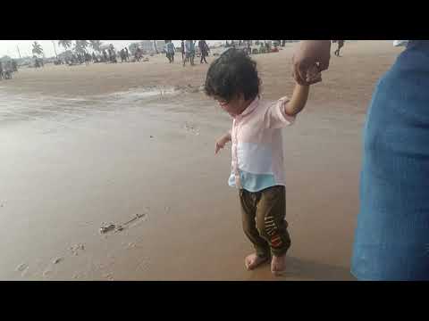 Little Satwik's  beach walk at Suryalanka