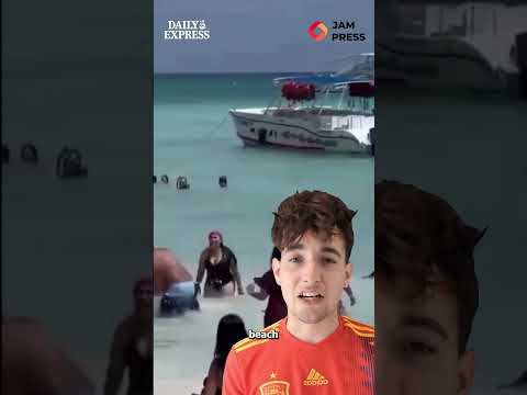 Man 'hits wife' on packed beach before onlookers pull him away and pummel him in sea 😱  #news