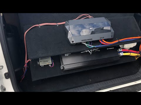 2 15 INCH SUBS BEHIND BACK SEATS WALL BUILD