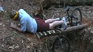 preview picture of video 'Guy Riding Mountian Bike Falls Through Wood Bridge'