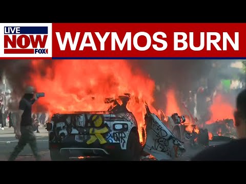 Video | Cars go up in flames as anti-ICE protests, clashes with authorities continue in downtown Los Angeles